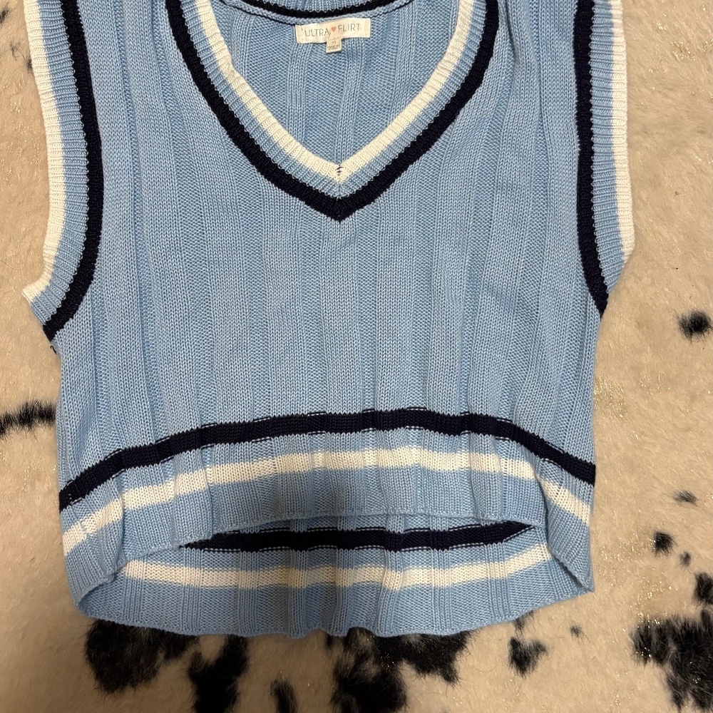 blue vest